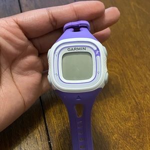 Purple and White Garmin Forefunner 15 Watch